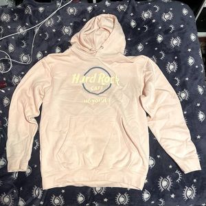 Beautifully soft pink pastel hoodie for all the hard rock fans out there!